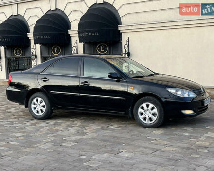 Черный Тойота Камри, объемом двигателя 2.4 л и пробегом 325 тыс. км за 4500 $, фото 3 на Automoto.ua