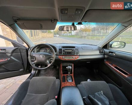 Черный Тойота Камри, объемом двигателя 2.4 л и пробегом 325 тыс. км за 4500 $, фото 8 на Automoto.ua