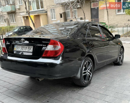 Черный Тойота Камри, объемом двигателя 2.36 л и пробегом 353 тыс. км за 6500 $, фото 12 на Automoto.ua