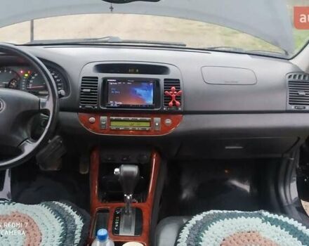 Черный Тойота Камри, объемом двигателя 2.4 л и пробегом 290 тыс. км за 7000 $, фото 5 на Automoto.ua