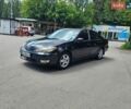 Черный Тойота Камри, объемом двигателя 2.36 л и пробегом 377 тыс. км за 3300 $, фото 1 на Automoto.ua
