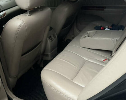 Черный Тойота Камри, объемом двигателя 2.36 л и пробегом 353 тыс. км за 6500 $, фото 20 на Automoto.ua