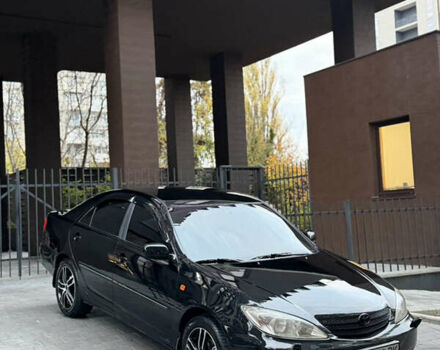 Черный Тойота Камри, объемом двигателя 2.36 л и пробегом 353 тыс. км за 6500 $, фото 1 на Automoto.ua