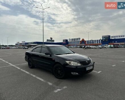 Черный Тойота Камри, объемом двигателя 2.4 л и пробегом 375 тыс. км за 5000 $, фото 4 на Automoto.ua