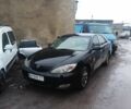 Чорний Тойота Камрі, об'ємом двигуна 2.4 л та пробігом 250 тис. км за 2800 $, фото 1 на Automoto.ua