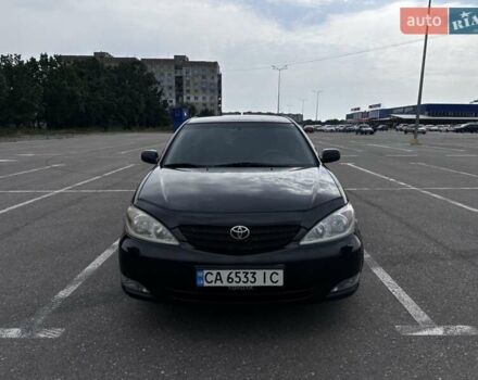 Черный Тойота Камри, объемом двигателя 2.4 л и пробегом 375 тыс. км за 5000 $, фото 22 на Automoto.ua
