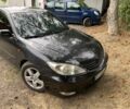 Чорний Тойота Камрі, об'ємом двигуна 2.4 л та пробігом 300 тис. км за 3898 $, фото 1 на Automoto.ua