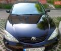 Чорний Тойота Камрі, об'ємом двигуна 2.4 л та пробігом 325 тис. км за 5000 $, фото 1 на Automoto.ua