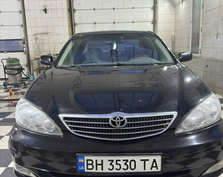 Черный Тойота Камри, объемом двигателя 2.36 л и пробегом 527 тыс. км за 5400 $, фото 6 на Automoto.ua