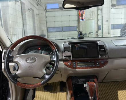 Черный Тойота Камри, объемом двигателя 2.36 л и пробегом 527 тыс. км за 5400 $, фото 20 на Automoto.ua