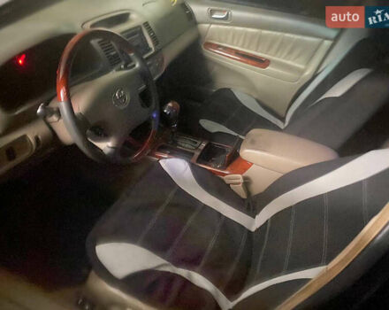 Черный Тойота Камри, объемом двигателя 2.36 л и пробегом 361 тыс. км за 3999 $, фото 4 на Automoto.ua