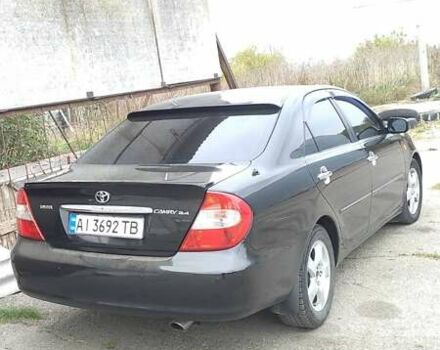 Чорний Тойота Камрі, об'ємом двигуна 2.4 л та пробігом 300 тис. км за 6500 $, фото 3 на Automoto.ua