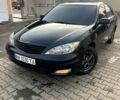 Чорний Тойота Камрі, об'ємом двигуна 2.4 л та пробігом 527 тис. км за 5200 $, фото 1 на Automoto.ua