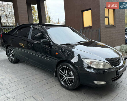 Черный Тойота Камри, объемом двигателя 2.36 л и пробегом 353 тыс. км за 6500 $, фото 16 на Automoto.ua