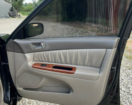 Чорний Тойота Камрі, об'ємом двигуна 2.36 л та пробігом 511 тис. км за 7600 $, фото 32 на Automoto.ua