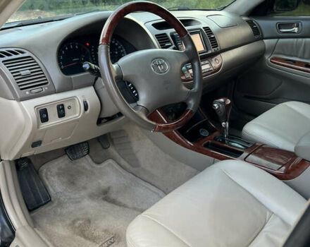 Чорний Тойота Камрі, об'ємом двигуна 2.36 л та пробігом 511 тис. км за 7600 $, фото 25 на Automoto.ua