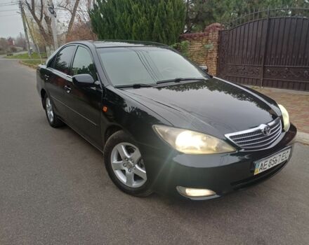 Черный Тойота Камри, объемом двигателя 2.4 л и пробегом 250 тыс. км за 5500 $, фото 3 на Automoto.ua
