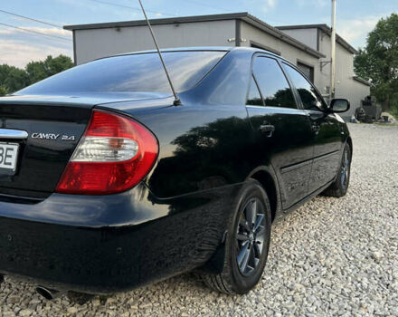 Чорний Тойота Камрі, об'ємом двигуна 2.36 л та пробігом 511 тис. км за 7600 $, фото 11 на Automoto.ua