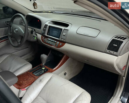 Черный Тойота Камри, объемом двигателя 2.36 л и пробегом 353 тыс. км за 6500 $, фото 22 на Automoto.ua