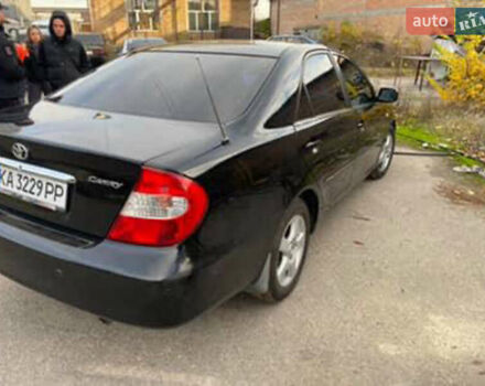 Черный Тойота Камри, объемом двигателя 2.36 л и пробегом 361 тыс. км за 3999 $, фото 1 на Automoto.ua