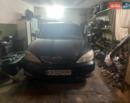 Черный Тойота Камри, объемом двигателя 2.36 л и пробегом 361 тыс. км за 3999 $, фото 5 на Automoto.ua