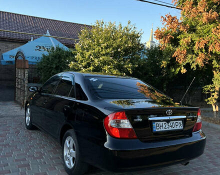 Черный Тойота Камри, объемом двигателя 2.4 л и пробегом 268 тыс. км за 5750 $, фото 19 на Automoto.ua
