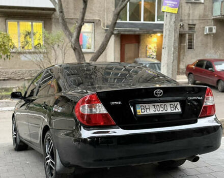 Черный Тойота Камри, объемом двигателя 2.36 л и пробегом 353 тыс. км за 6500 $, фото 8 на Automoto.ua