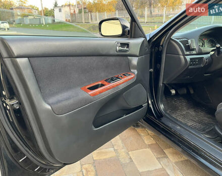 Черный Тойота Камри, объемом двигателя 2.4 л и пробегом 325 тыс. км за 4500 $, фото 9 на Automoto.ua