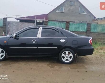 Черный Тойота Камри, объемом двигателя 2.4 л и пробегом 290 тыс. км за 7000 $, фото 3 на Automoto.ua