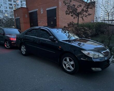 Черный Тойота Камри, объемом двигателя 2.4 л и пробегом 313 тыс. км за 5800 $, фото 21 на Automoto.ua