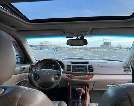 Черный Тойота Камри, объемом двигателя 2.4 л и пробегом 313 тыс. км за 5800 $, фото 11 на Automoto.ua