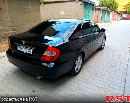 Черный Тойота Камри, объемом двигателя 3 л и пробегом 344 тыс. км за 6300 $, фото 1 на Automoto.ua