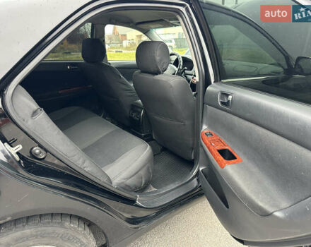 Черный Тойота Камри, объемом двигателя 2.4 л и пробегом 553 тыс. км за 5100 $, фото 7 на Automoto.ua