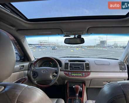Черный Тойота Камри, объемом двигателя 2.4 л и пробегом 315 тыс. км за 5800 $, фото 10 на Automoto.ua