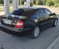 Чорний Тойота Камрі, об'ємом двигуна 2.36 л та пробігом 320 тис. км за 4700 $, фото 9 на Automoto.ua