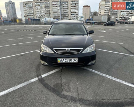 Черный Тойота Камри, объемом двигателя 2.4 л и пробегом 315 тыс. км за 5800 $, фото 8 на Automoto.ua