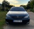 Черный Тойота Камри, объемом двигателя 3 л и пробегом 200 тыс. км за 4500 $, фото 1 на Automoto.ua