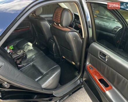 Черный Тойота Камри, объемом двигателя 2.37 л и пробегом 437 тыс. км за 6400 $, фото 25 на Automoto.ua