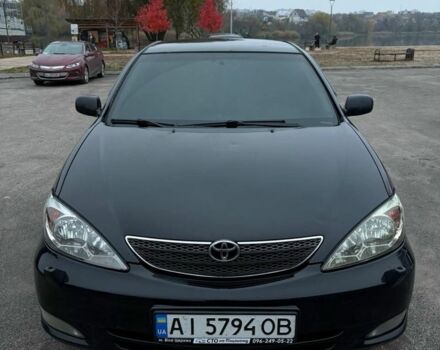Черный Тойота Камри, объемом двигателя 2.4 л и пробегом 570 тыс. км за 6199 $, фото 4 на Automoto.ua