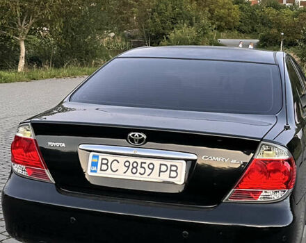 Черный Тойота Камри, объемом двигателя 2.4 л и пробегом 317 тыс. км за 5650 $, фото 4 на Automoto.ua
