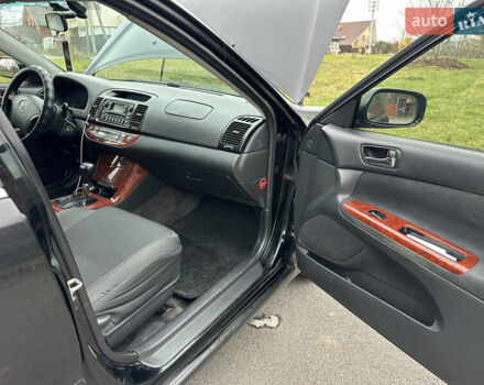 Черный Тойота Камри, объемом двигателя 2.4 л и пробегом 553 тыс. км за 5100 $, фото 6 на Automoto.ua