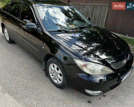 Черный Тойота Камри, объемом двигателя 2.37 л и пробегом 437 тыс. км за 6400 $, фото 30 на Automoto.ua