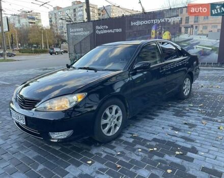 Черный Тойота Камри, объемом двигателя 3 л и пробегом 300 тыс. км за 4400 $, фото 1 на Automoto.ua