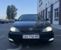 Черный Тойота Камри, объемом двигателя 3 л и пробегом 200 тыс. км за 3500 $, фото 1 на Automoto.ua