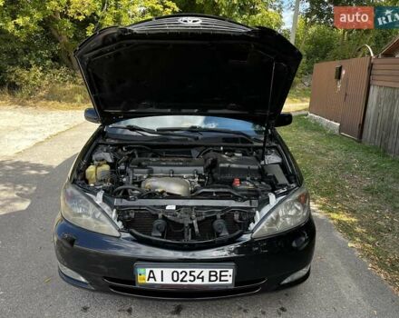 Черный Тойота Камри, объемом двигателя 2.37 л и пробегом 437 тыс. км за 6400 $, фото 13 на Automoto.ua