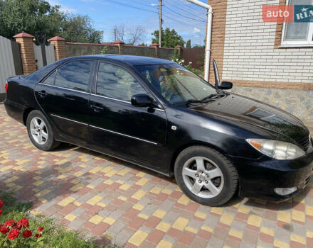 Чорний Тойота Камрі, об'ємом двигуна 3 л та пробігом 370 тис. км за 4999 $, фото 2 на Automoto.ua