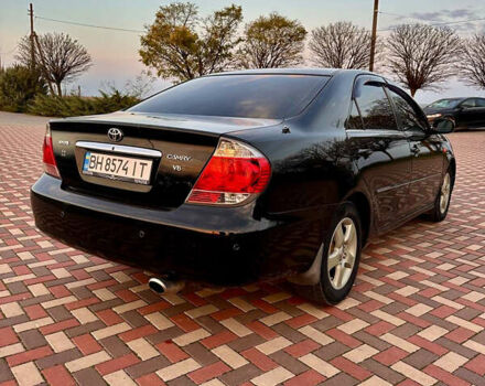 Черный Тойота Камри, объемом двигателя 3 л и пробегом 285 тыс. км за 6500 $, фото 4 на Automoto.ua