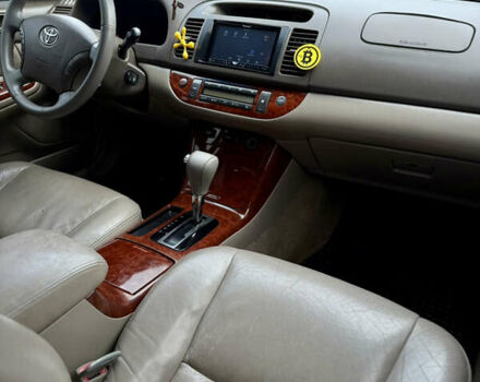 Чорний Тойота Камрі, об'ємом двигуна 3 л та пробігом 203 тис. км за 3999 $, фото 16 на Automoto.ua