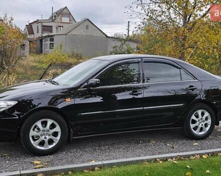 Тойота Камри 2004 в Каменское - Днепродзержинск на Automoto.ua Черный Тойота Камри, объемом двигателя 2 л и пробегом 180 тыс. км за 6700 $, фото 2 на Automoto.ua