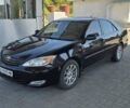 Чорний Тойота Камрі, об'ємом двигуна 2.36 л та пробігом 320 тис. км за 4700 $, фото 1 на Automoto.ua